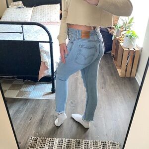 Levi Strauss Premium Light Wash High Waisted Distressed Mom Jeans — Women’s 28